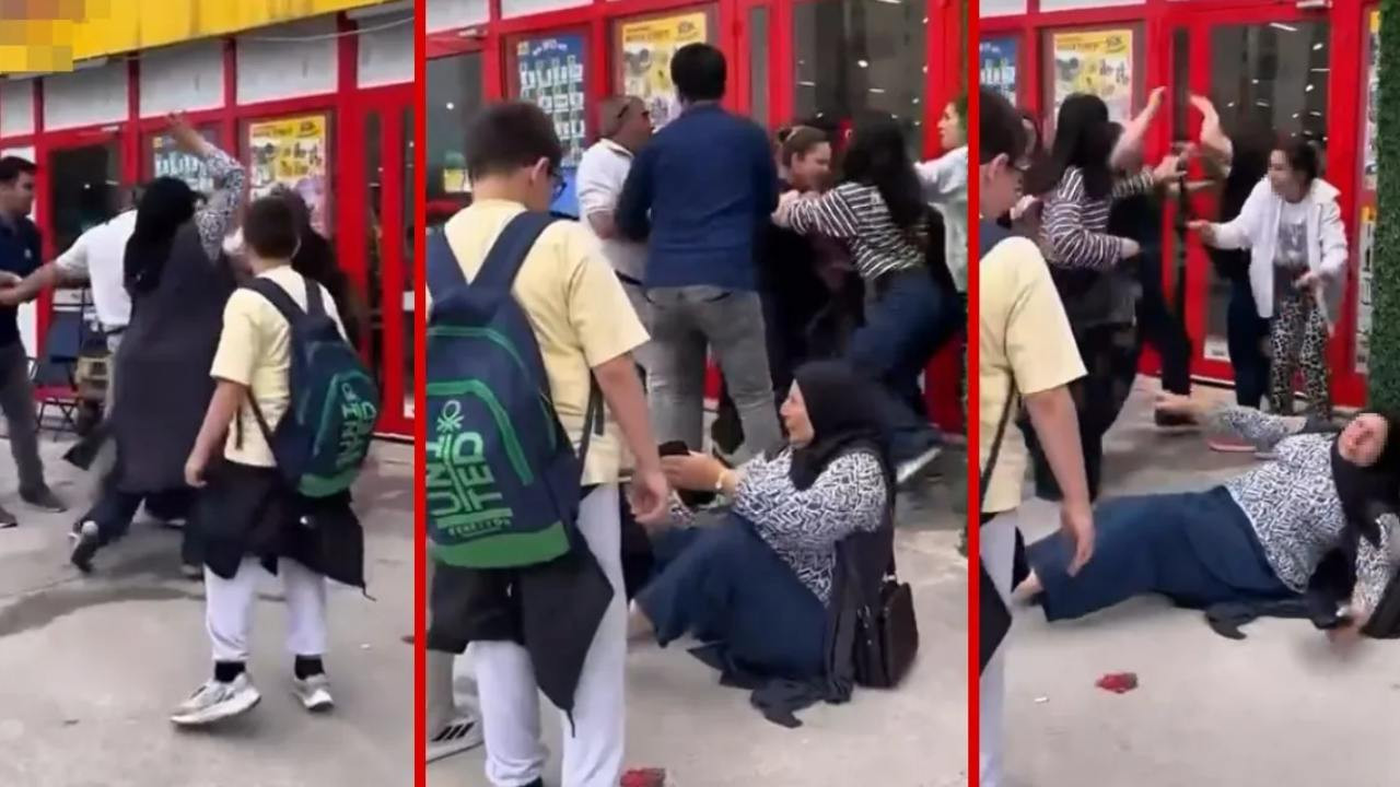 Markette başlayan tartışma sokağa taştı: Yumruk yumruğa kavga kamerada