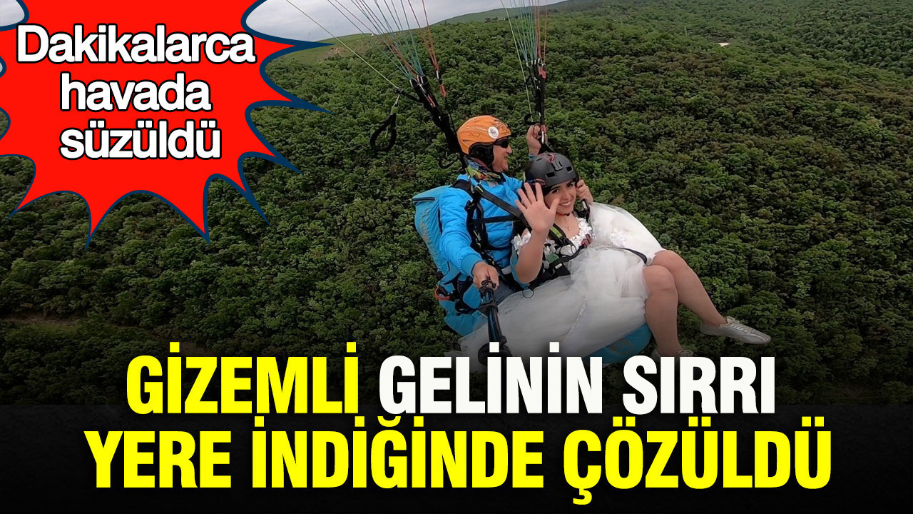 Gizemli gelinin sırrı yere indiğinde çözüldü: Dakikalarca havada süzüldü