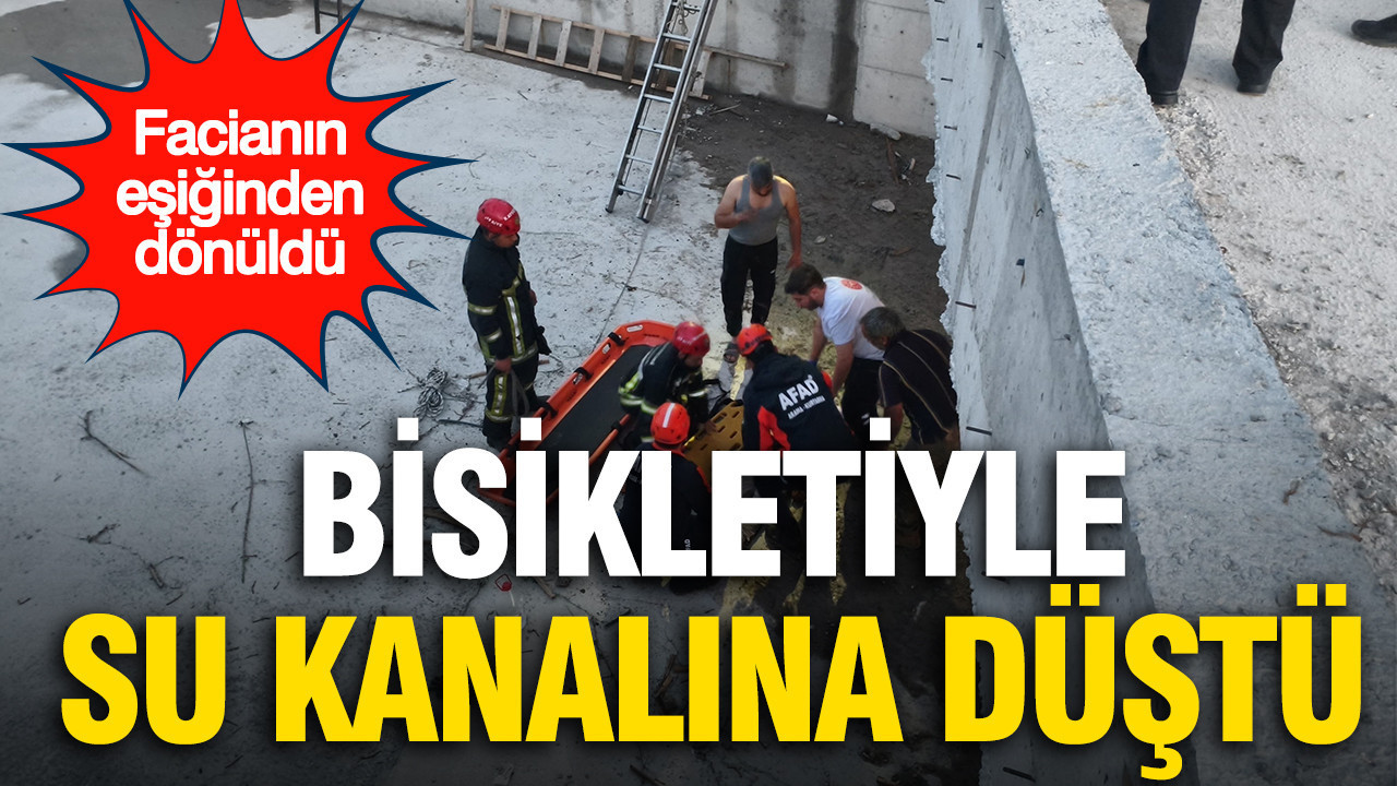Bisikletiyle su kanalına düştü: Faciadan son anda kurtuldu
