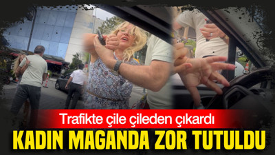 Trafikte çile çileden çıkardı: Kadın maganda zor tutuldu