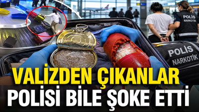 Valizden çıkanlar polisi bile şoke etti: Salça kutularına zula etmişler: Tam 10 kilo