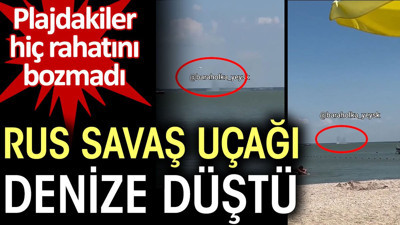 Rus savaş uçağı denize düştü. Plajdakiler hiç rahatını bozmadı