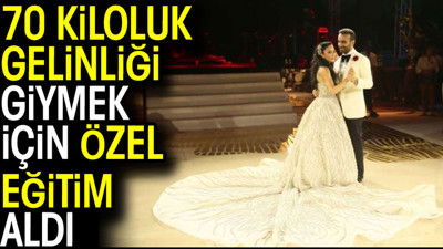 70 kiloluk gelinliği giymek için özel eğitim aldı