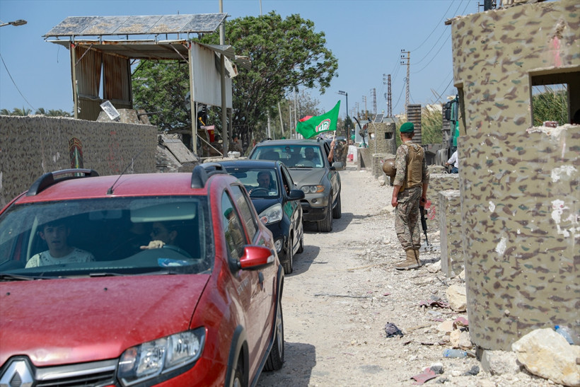 İsrail'le 10 günlük ateşkes ilan edildi Lübnanlılar güneydeki evlerine dönüyor - Resim : 3