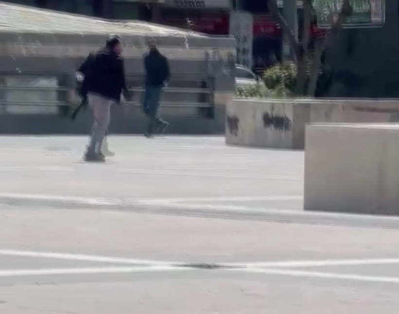 Elinde pompalı tüfekle meydana indi: Film sahnelerini aratmayan operasyon - Resim : 7