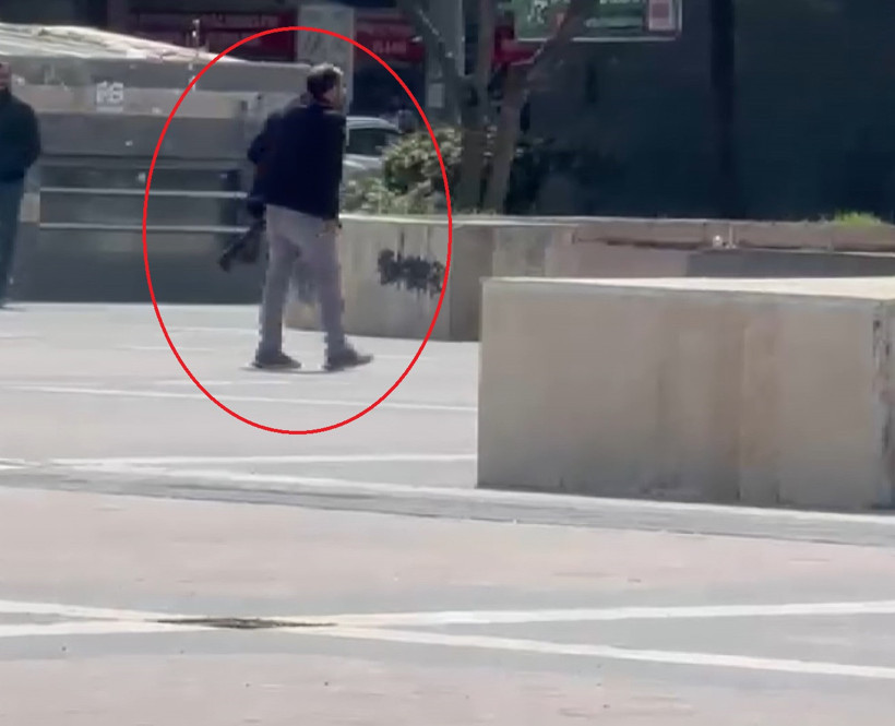 Elinde pompalı tüfekle meydana indi: Film sahnelerini aratmayan operasyon - Resim : 1